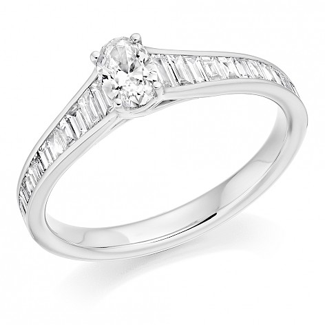 Platinum oval diamond set ring with baguette diamond set shoulders